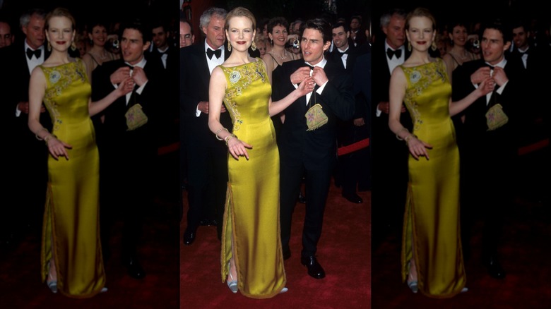 Nicole Kidman ler iklädd en grön satinklänning bredvid Tom Cruise