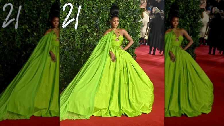 Gabrielle Union klädd i en grön klänning med matchande cape