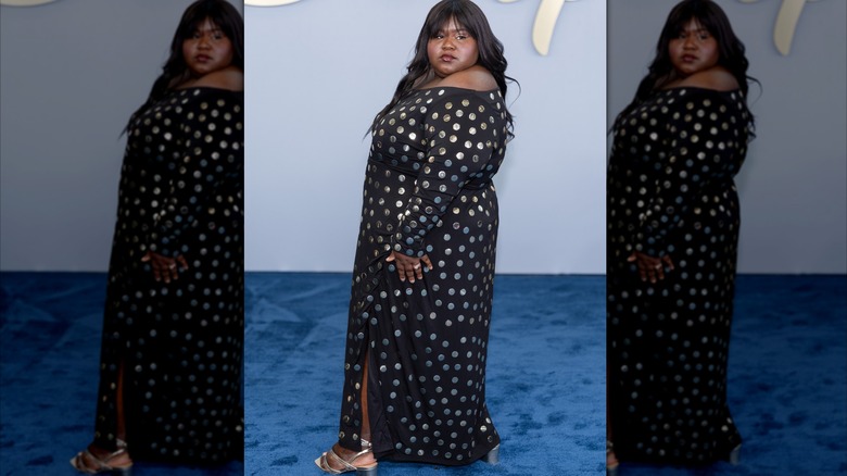 Gabourey Sidibe i en svart klänning med silverprickar